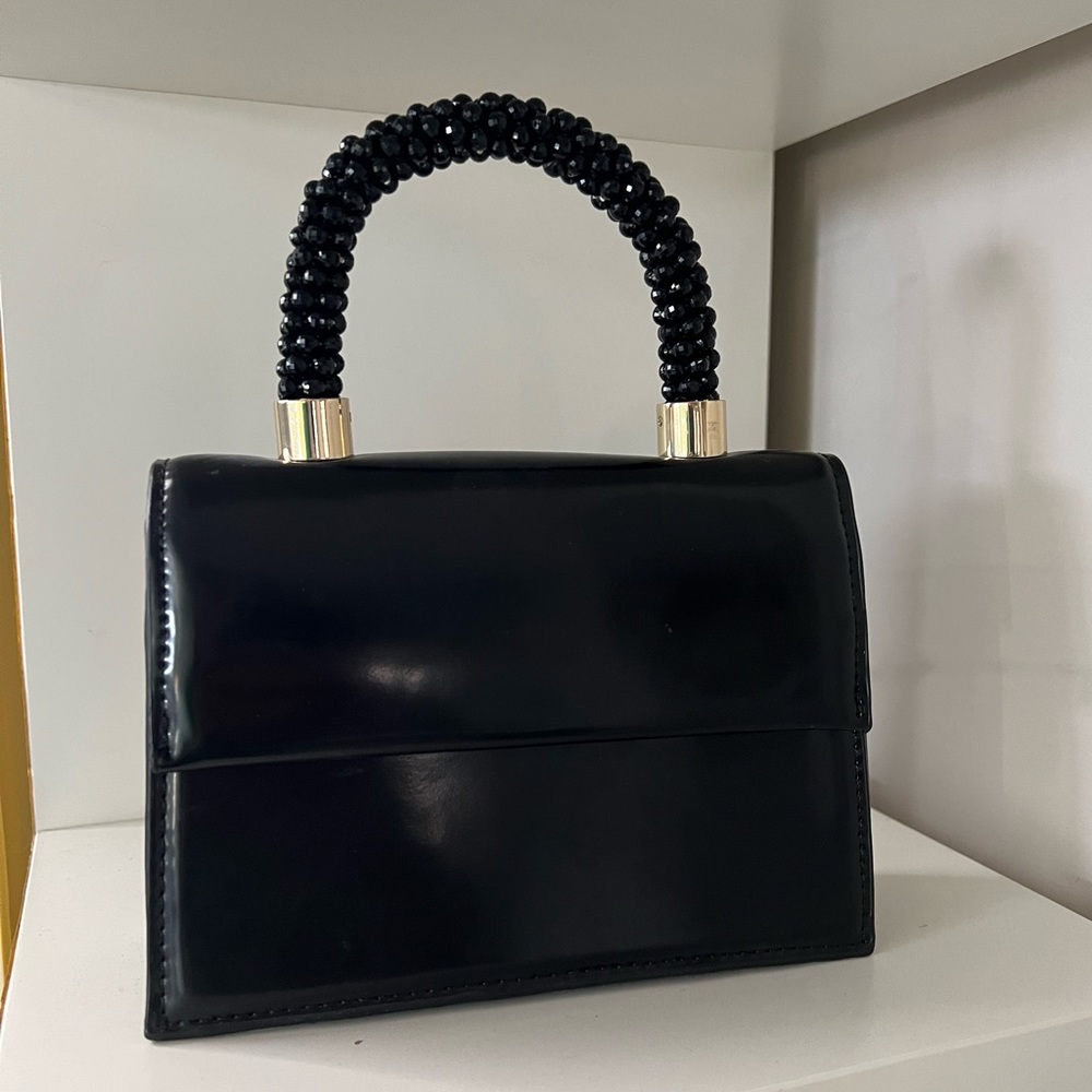 Black small ZARA hand back. Almost new